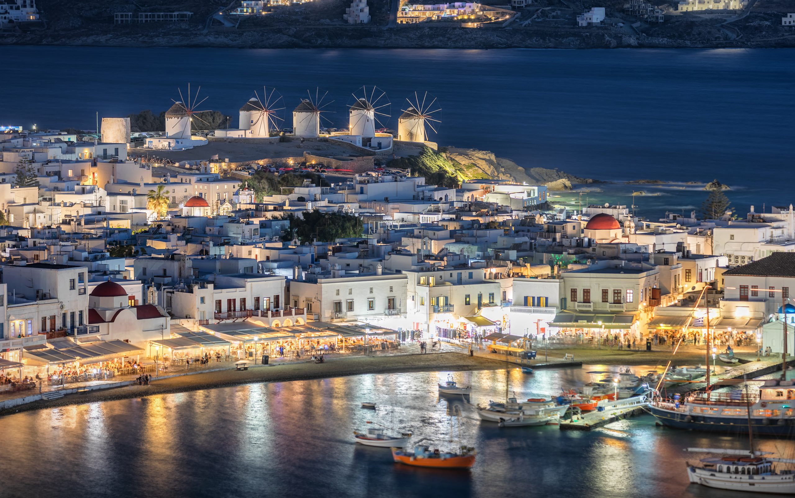 Mykonos coastline at night - one of the best island destinations to visit in the world.